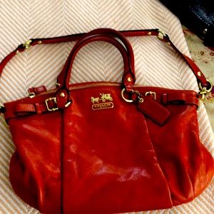 Coach red midsize pocket book with strap